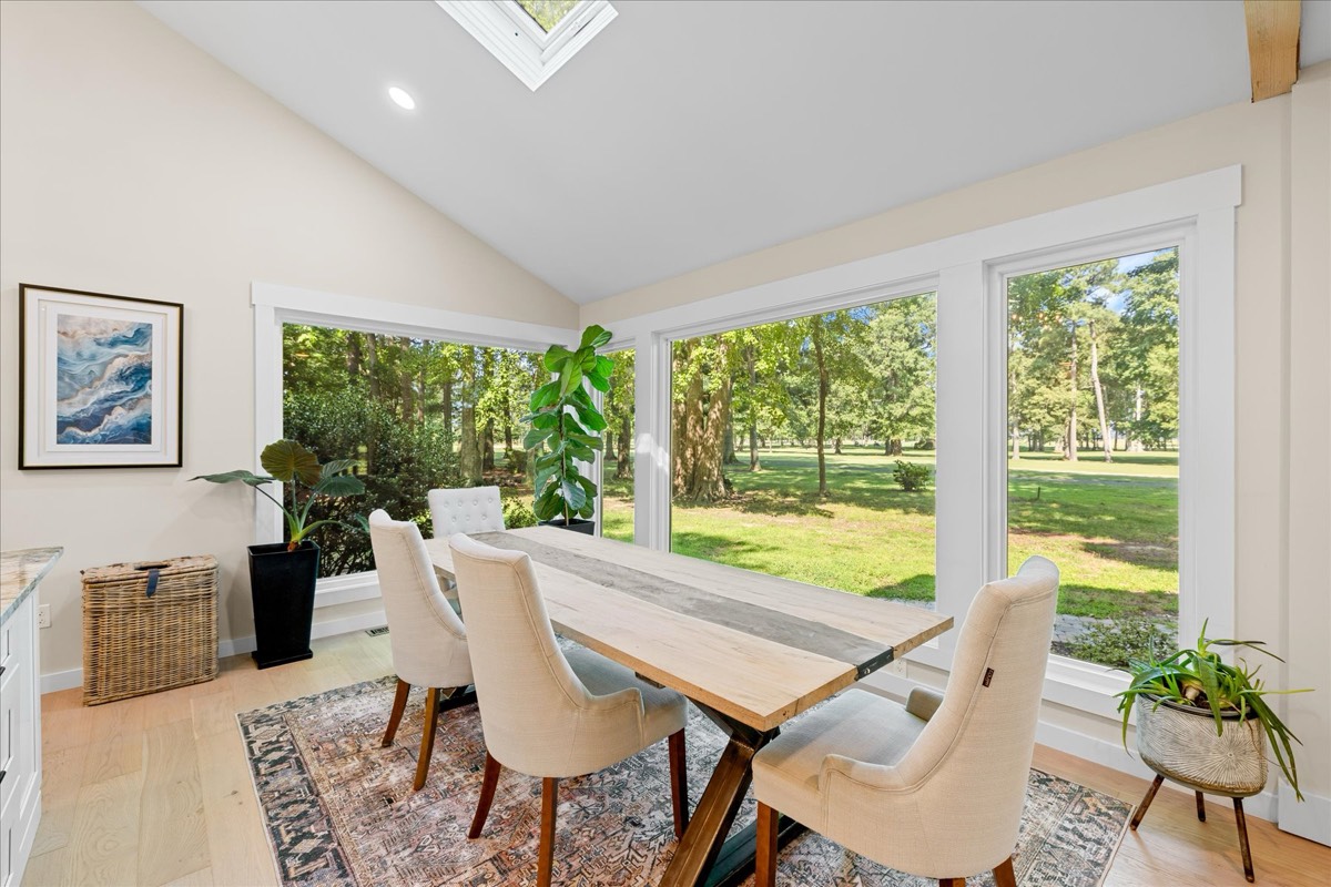 Sun-drenched dining nook with vaulted ceiling